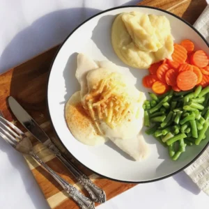 Baked fish with mornay sauce, mash potato, beans, carrots