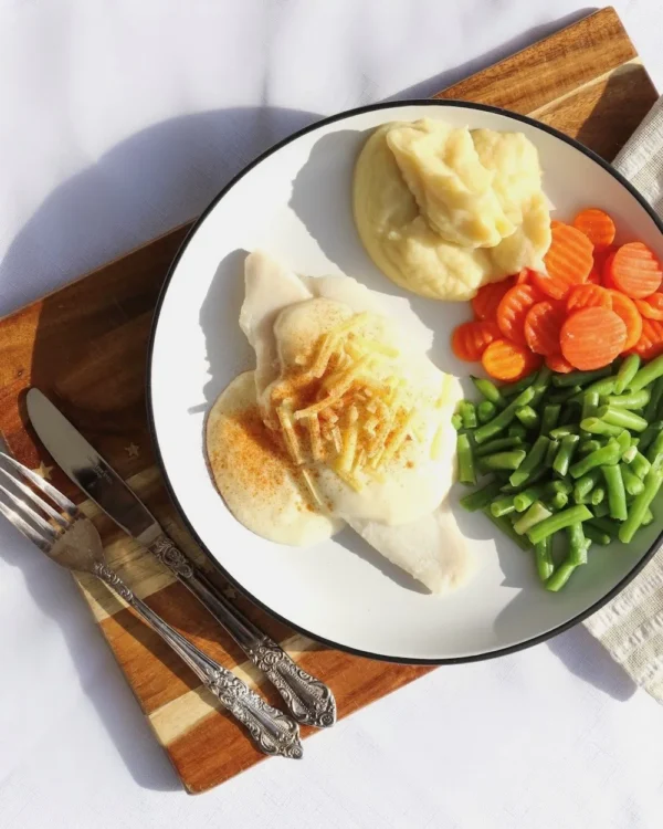 Baked fish with mornay sauce, mash potato, beans, carrots