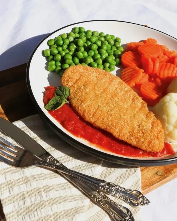 Chicken parmigiana and vegetables