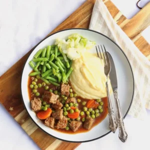 Lamb casserole with mash, beans, cabbage