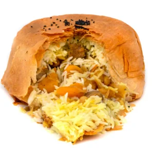 Azerbaijanian savory pastry filled with saffron infused rice, lamb, and dried fruits